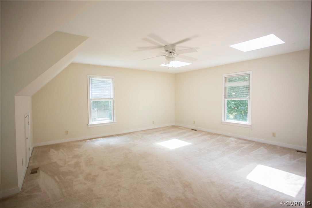 5111 Rock Harbour Road Midlothian, VA 23112 - Photo 34 of 50 an empty room with a window and a ceiling fan