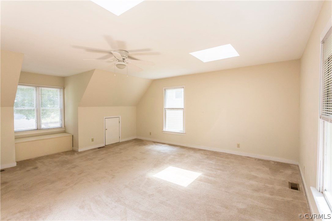 5111 Rock Harbour Road Midlothian, VA 23112 - Photo 35 of 50 an empty room with windows and fan