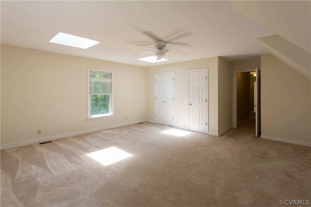 5111 Rock Harbour Road Midlothian, VA 23112 - Photo 37 of 50 an empty room with windows and fan