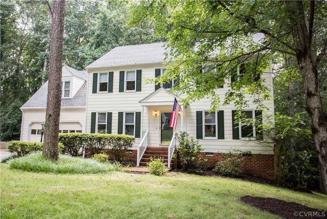 5111 Rock Harbour Road Midlothian, VA 23112 - Photo 43 of 50 a front view of a house with a yard and trees