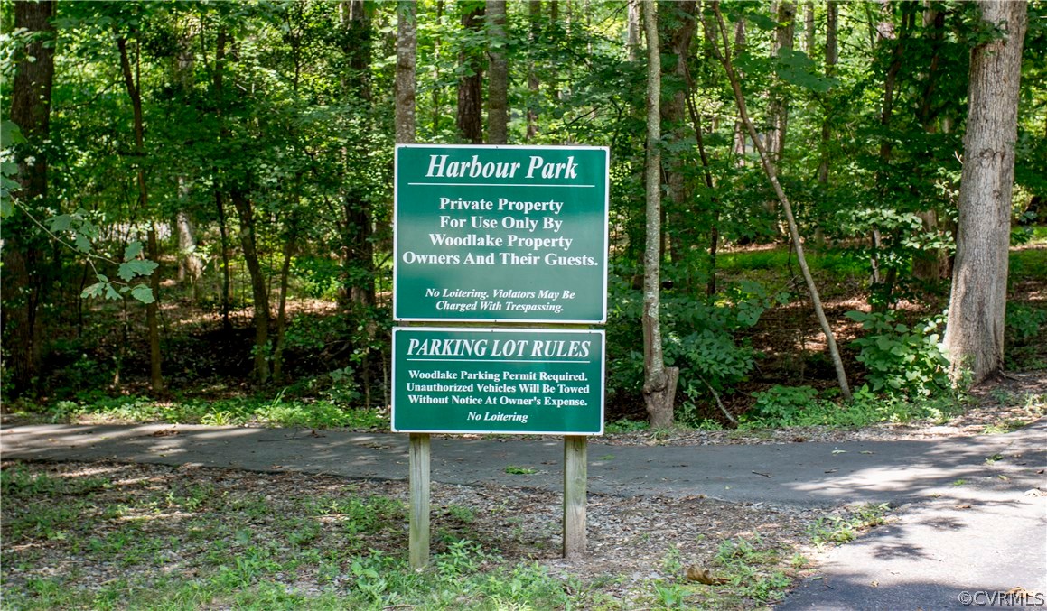 5111 Rock Harbour Road Midlothian, VA 23112 - Photo 44 of 50 a sign on the side of the road