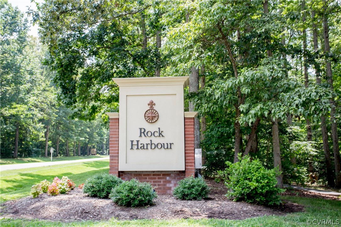 5111 Rock Harbour Road Midlothian, VA 23112 - Photo 45 of 50 a sign on the side of the road