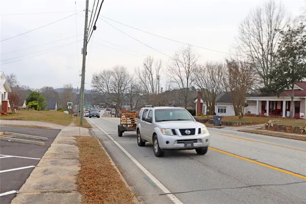 a view of a street with a building