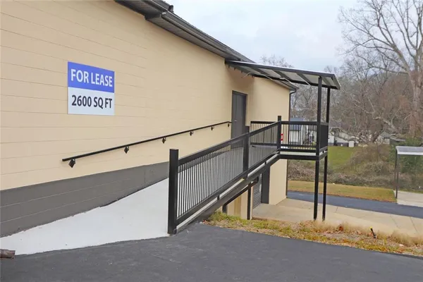 a view of a street with wooden stairs