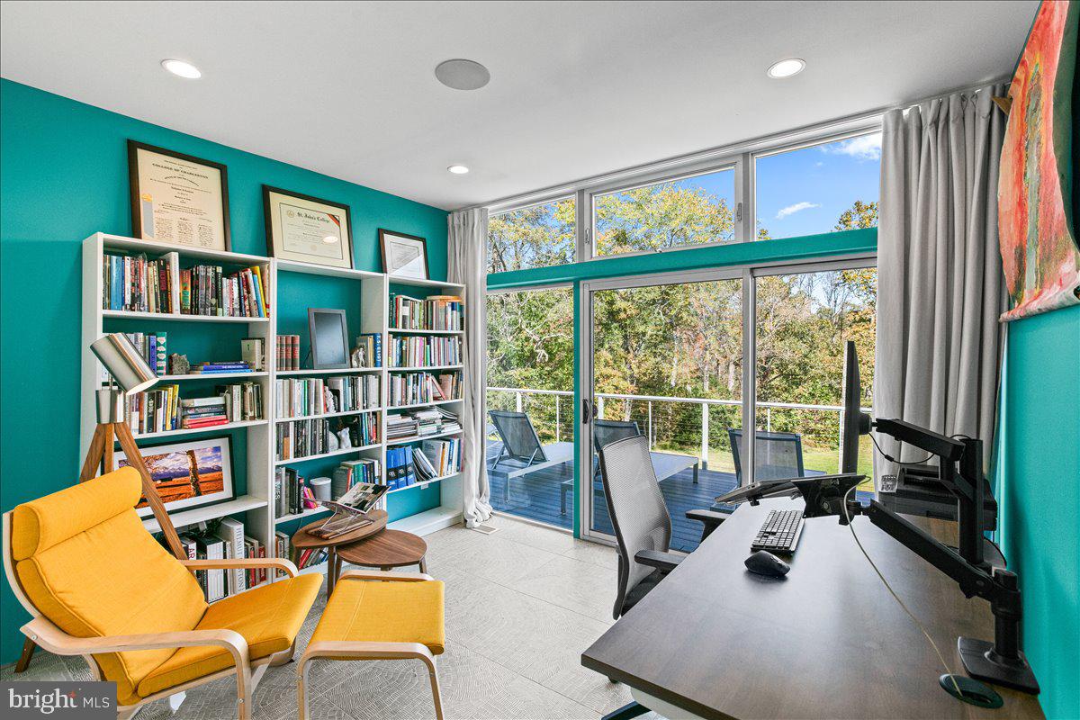 10222 Van Thompson Road Fairfax Station, VA 22039 - Photo 16 of 37 a living room with lots of furniture and a large window