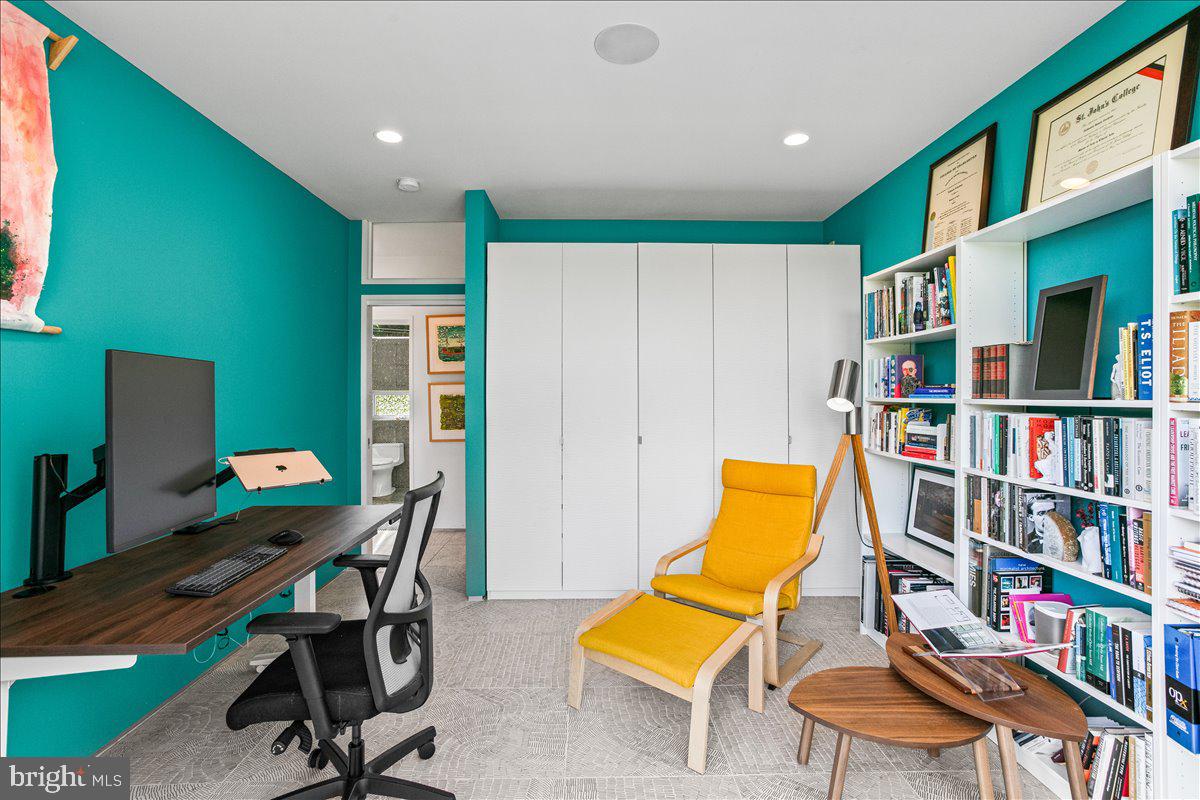 10222 Van Thompson Road Fairfax Station, VA 22039 - Photo 17 of 37 a view of a workspace with furniture