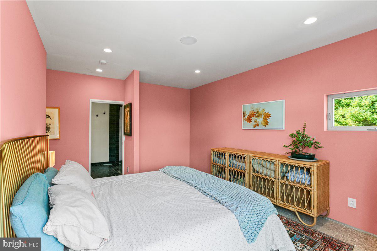 10222 Van Thompson Road Fairfax Station, VA 22039 - Photo 20 of 37 a bedroom with a bed and wooden floor