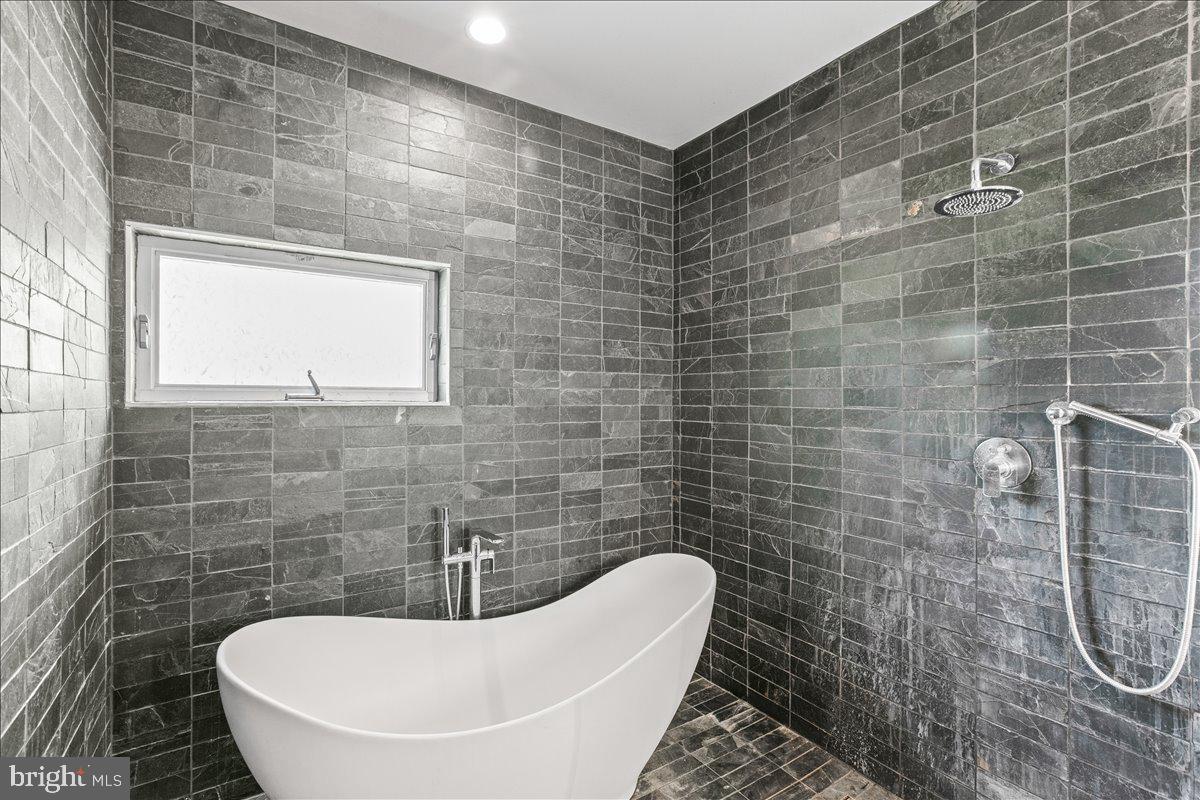 10222 Van Thompson Road Fairfax Station, VA 22039 - Photo 22 of 37 a bathroom with a shower