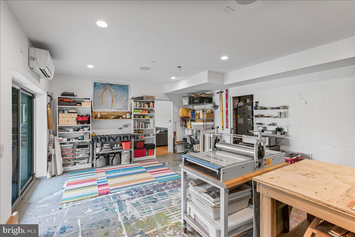 10222 Van Thompson Road Fairfax Station, VA 22039 - Photo 29 of 37 a kitchen with stainless steel appliances granite countertop a refrigerator and a stove