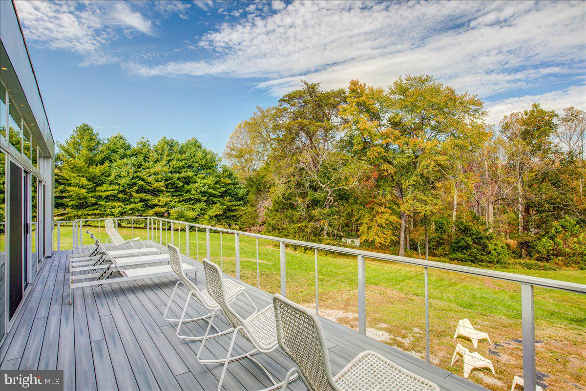 10222 Van Thompson Road Fairfax Station, VA 22039 - Photo 30 of 37 a view of a balcony with furniture