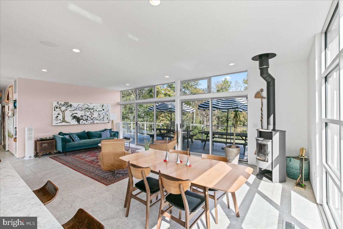10222 Van Thompson Road Fairfax Station, VA 22039 - Photo 8 of 37 a view of a dining room with furniture window and outside view