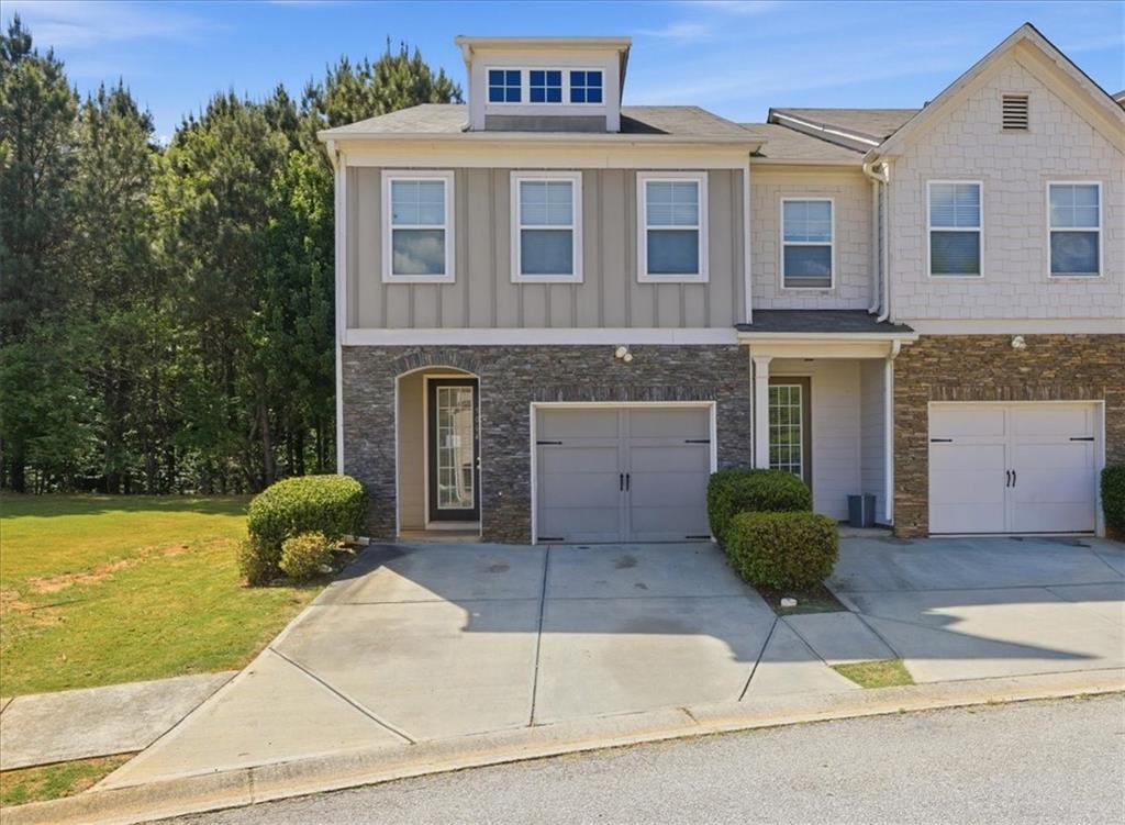 5064 Longview Walk Decatur, GA 30035 - Photo 1 of 30 a front view of a house with garden