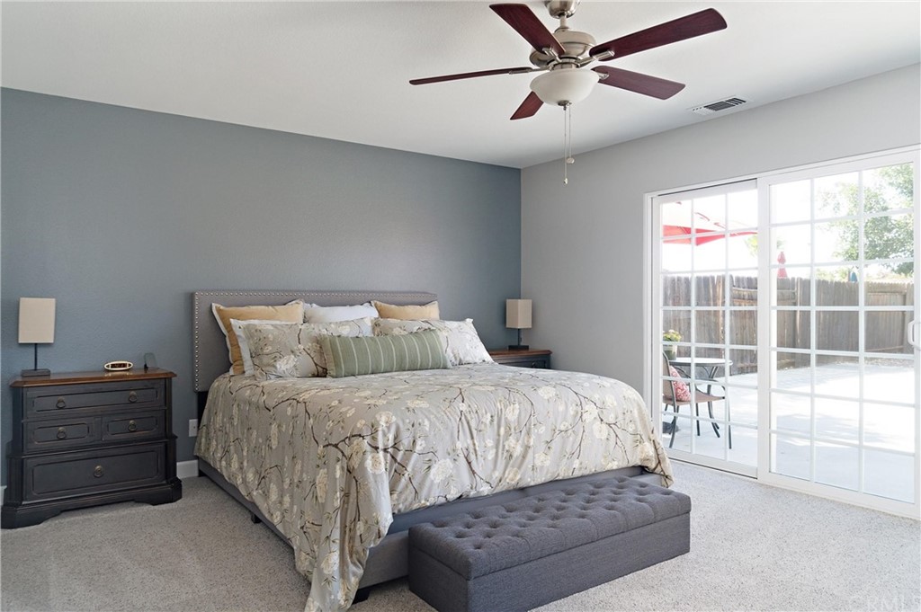 1833 Southfork Place Paso Robles, CA 93446 - Photo 13 of 35 a bedroom with a large bed and a large window