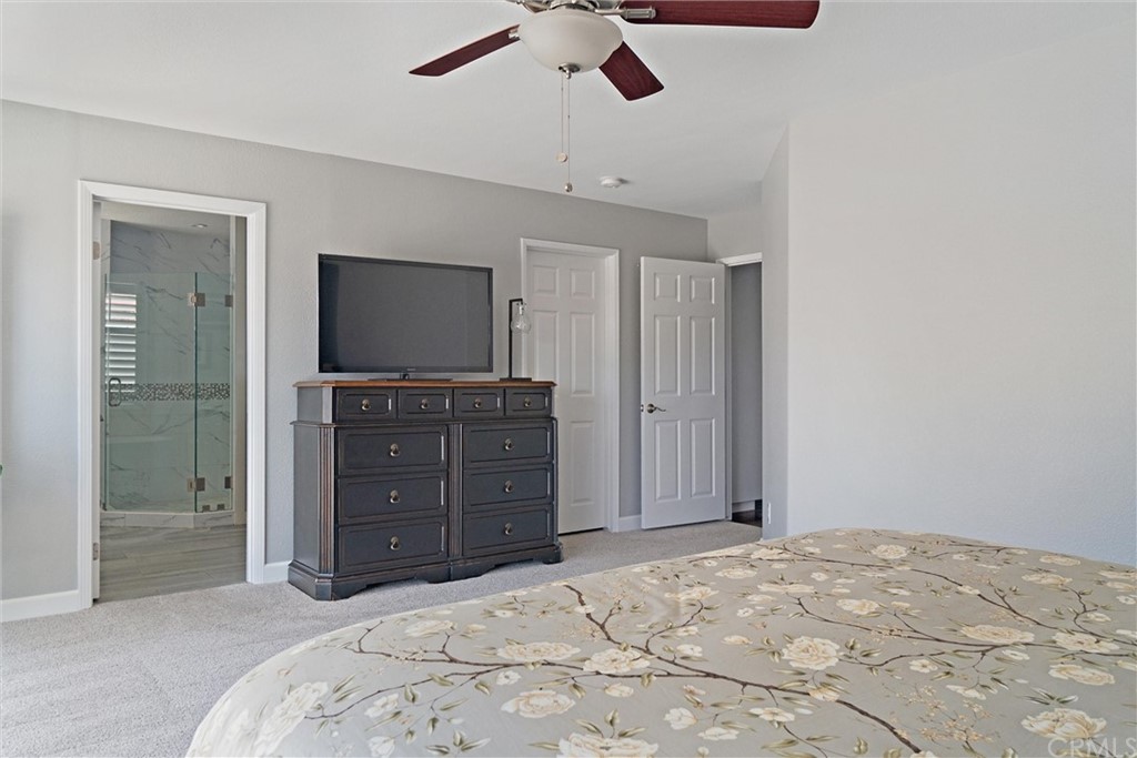 1833 Southfork Place Paso Robles, CA 93446 - Photo 14 of 35 a bed room with a bed and a television