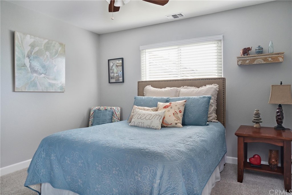 1833 Southfork Place Paso Robles, CA 93446 - Photo 17 of 35 a bedroom with a bed and a window