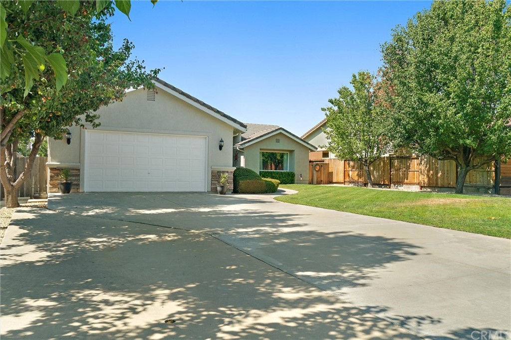 1833 Southfork Place Paso Robles, CA 93446 - Photo 2 of 35 a front view of a house with a yard and garage