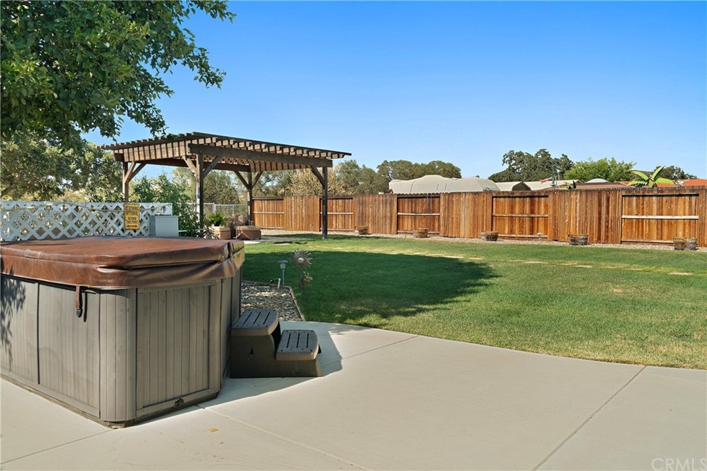 1833 Southfork Place Paso Robles, CA 93446 - Photo 23 of 35 a view of a house with backyard sitting area and garden