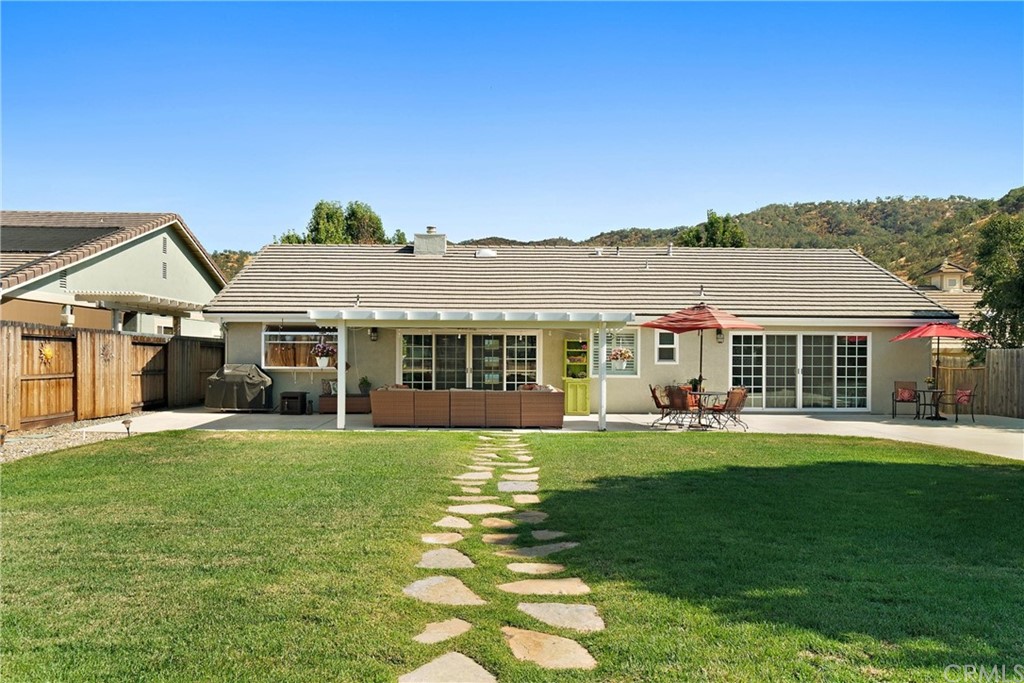 1833 Southfork Place Paso Robles, CA 93446 - Photo 24 of 35 a front view of a house with a garden