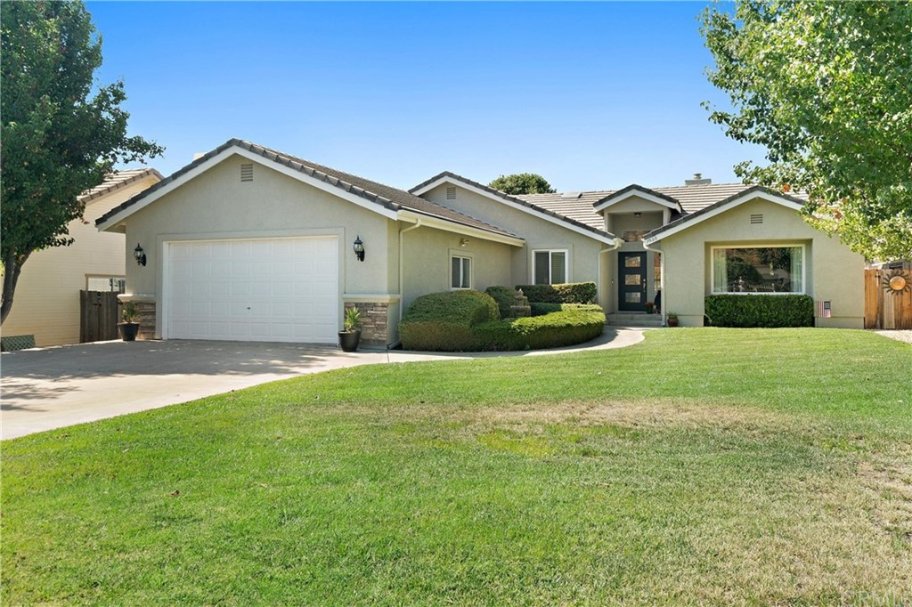 1833 Southfork Place Paso Robles, CA 93446 - Photo 29 of 35 a front view of a house with a garden and yard