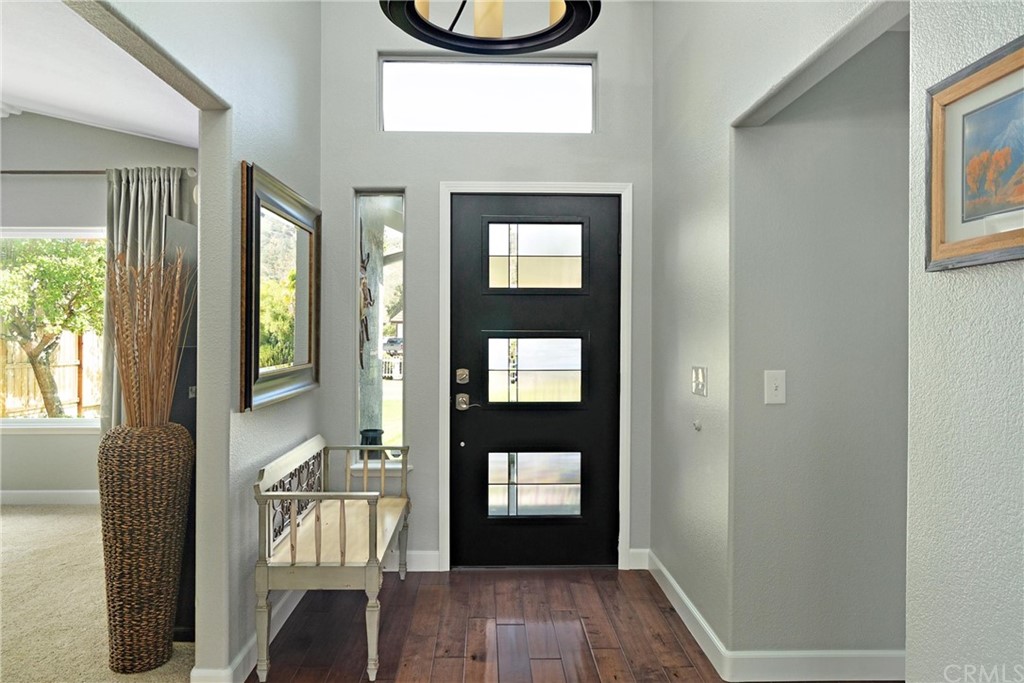 1833 Southfork Place Paso Robles, CA 93446 - Photo 4 of 35 a hallway with a wooden floor and a window