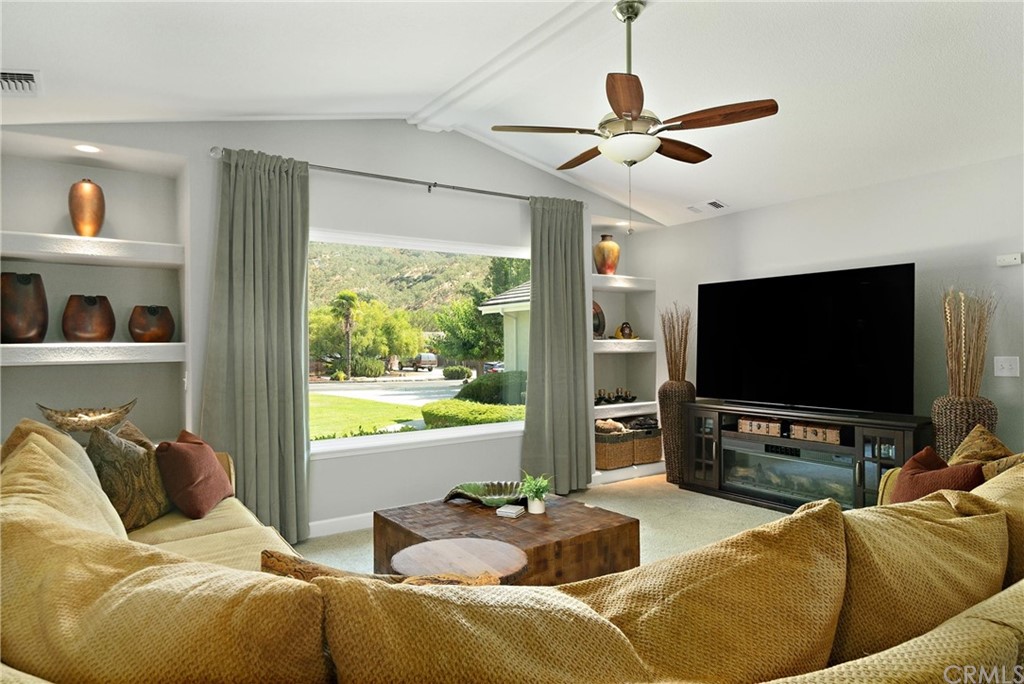 1833 Southfork Place Paso Robles, CA 93446 - Photo 5 of 35 a living room with furniture and a flat screen tv