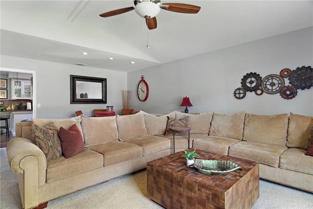1833 Southfork Place Paso Robles, CA 93446 - Photo 6 of 35 a living room with furniture ceiling fan and a rug