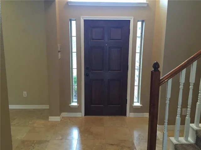 a view of elevator with hallway