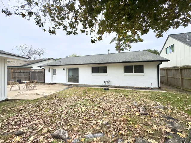 a view of backyard with green space