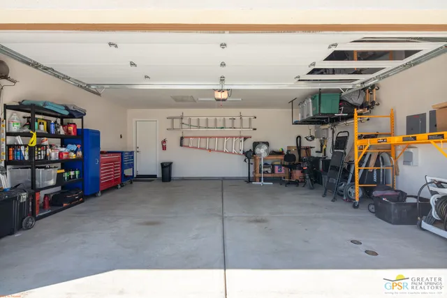 a view of a garage with storage