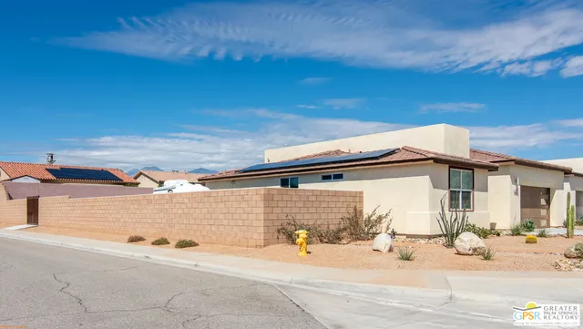 a view of a house with a patio