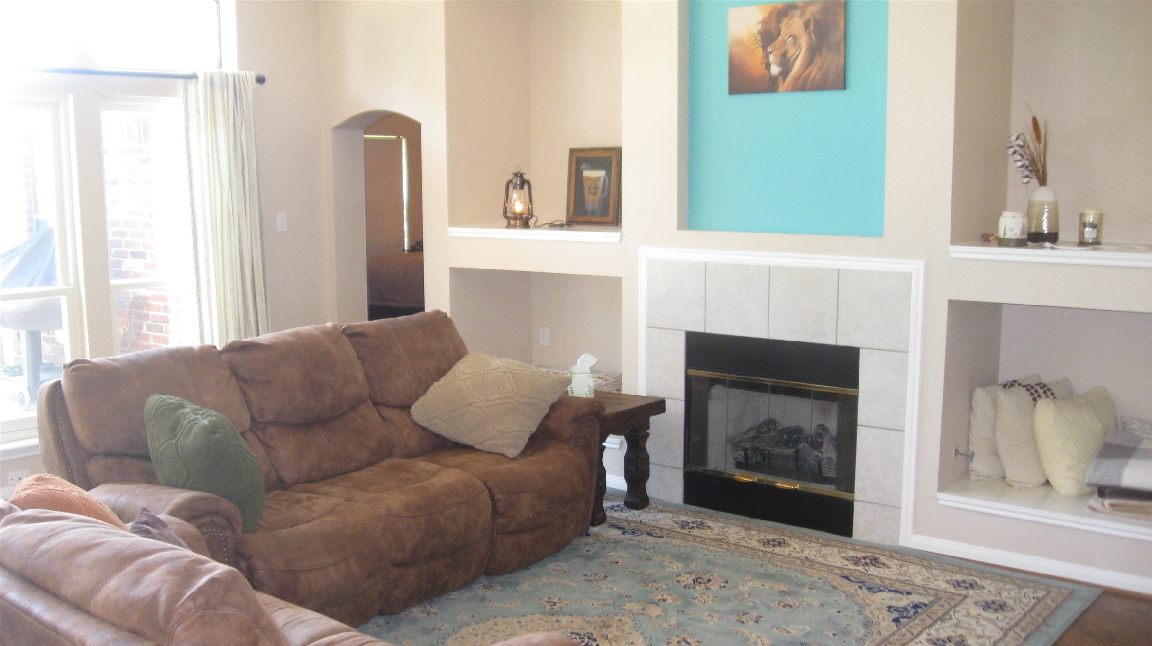 17330 Penick Road Waller, TX 77484 - Photo 7 of 10 a living room with furniture and a fireplace