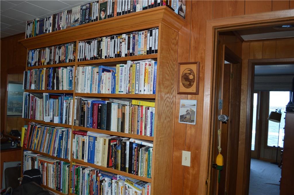 213 Paul Bunyan Road Corea, ME 04624 - Photo 6 of 23 Book shelves in second bedroom