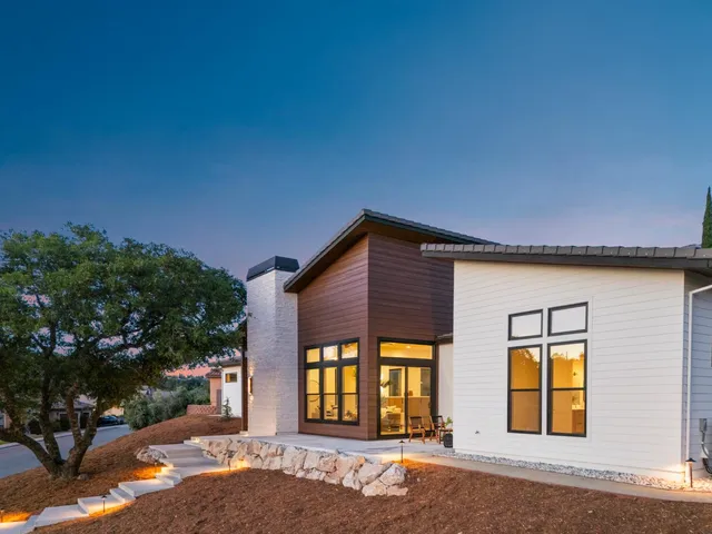 a front view of a house with a outdoor space