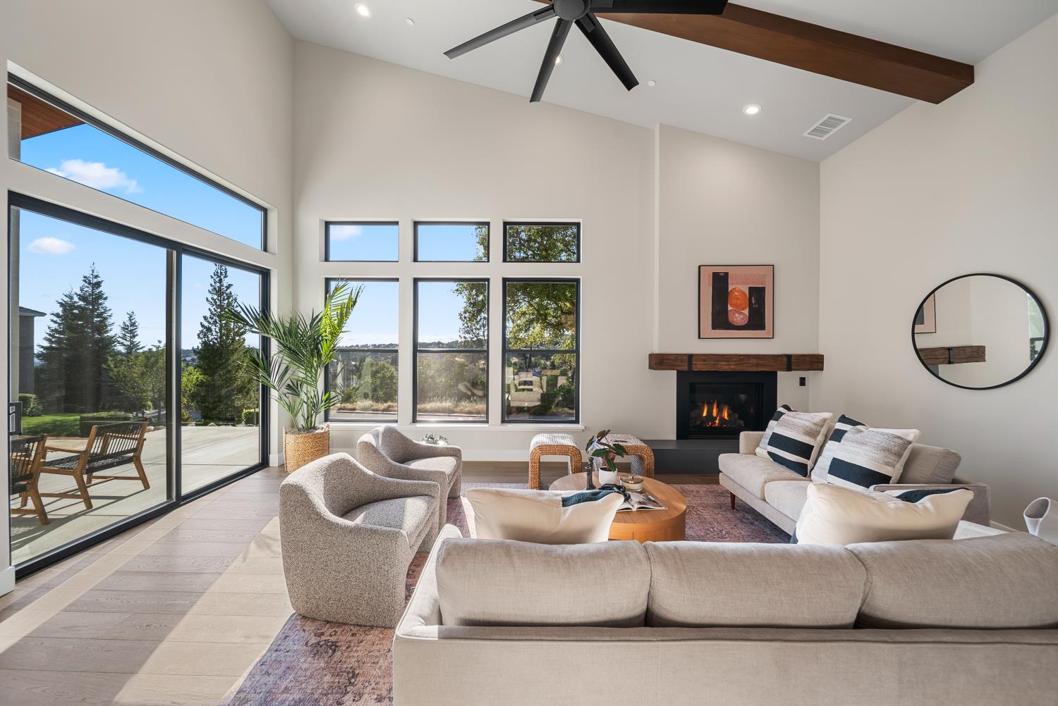 1700 Ridgeview Circle Auburn, CA 95603 - Photo 12 of 39 a living room with fireplace furniture and a large window