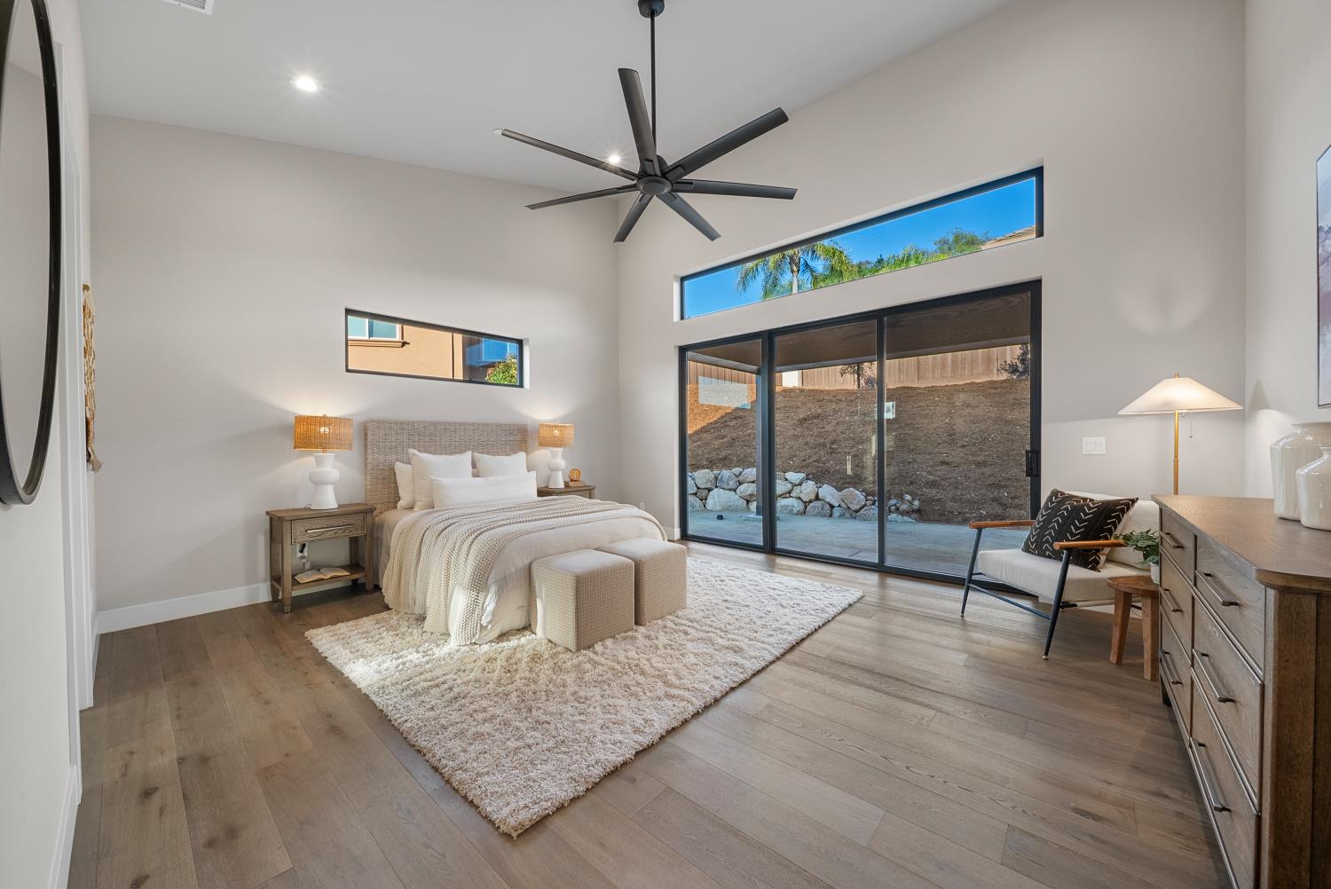 1700 Ridgeview Circle Auburn, CA 95603 - Photo 13 of 39 a bedroom with a bed and a chandelier