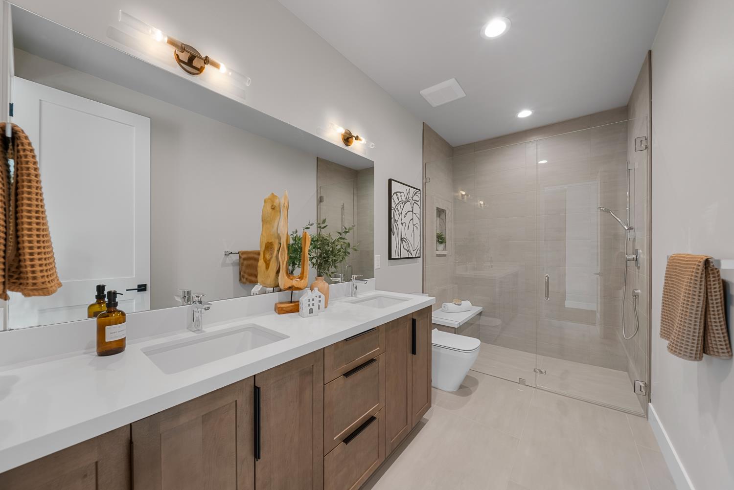 1700 Ridgeview Circle Auburn, CA 95603 - Photo 19 of 39 a bathroom with a double vanity sink toilet and shower