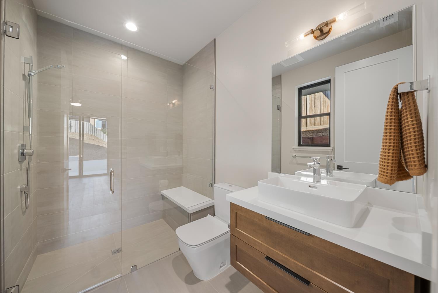 1700 Ridgeview Circle Auburn, CA 95603 - Photo 22 of 39 a bathroom with a sink a toilet and shower