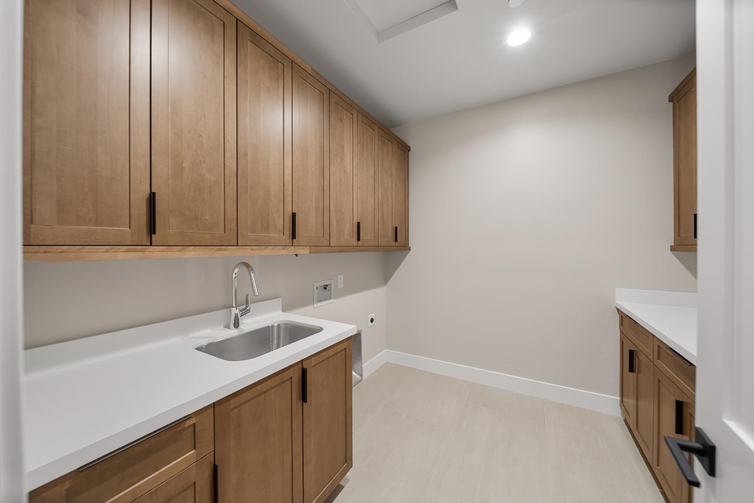1700 Ridgeview Circle Auburn, CA 95603 - Photo 30 of 39 a kitchen with a sink cabinets and stainless steel appliances