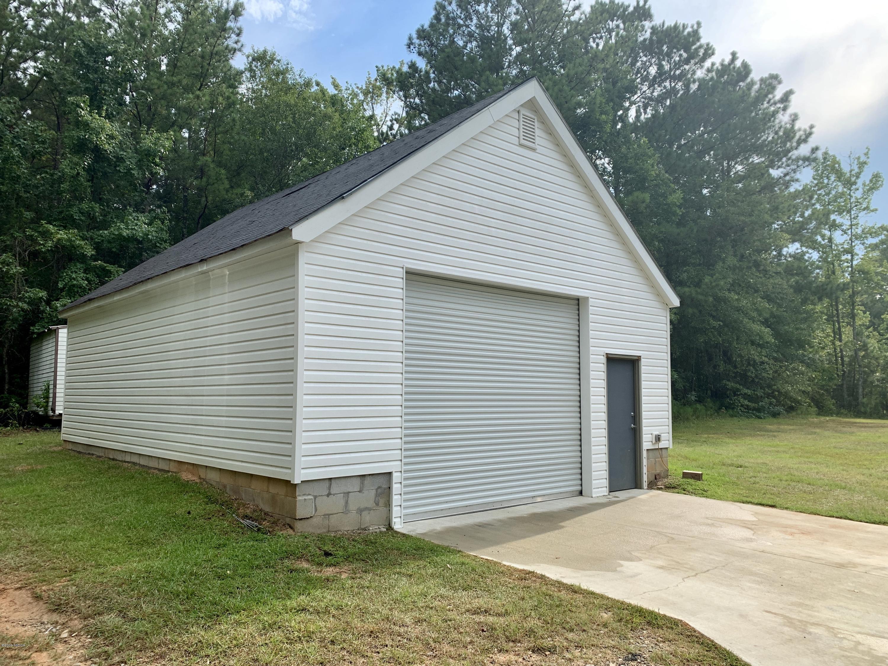 1325 Taylor Road Juliette, GA 31046 - Photo 2 of 18 a view of a house with a yard