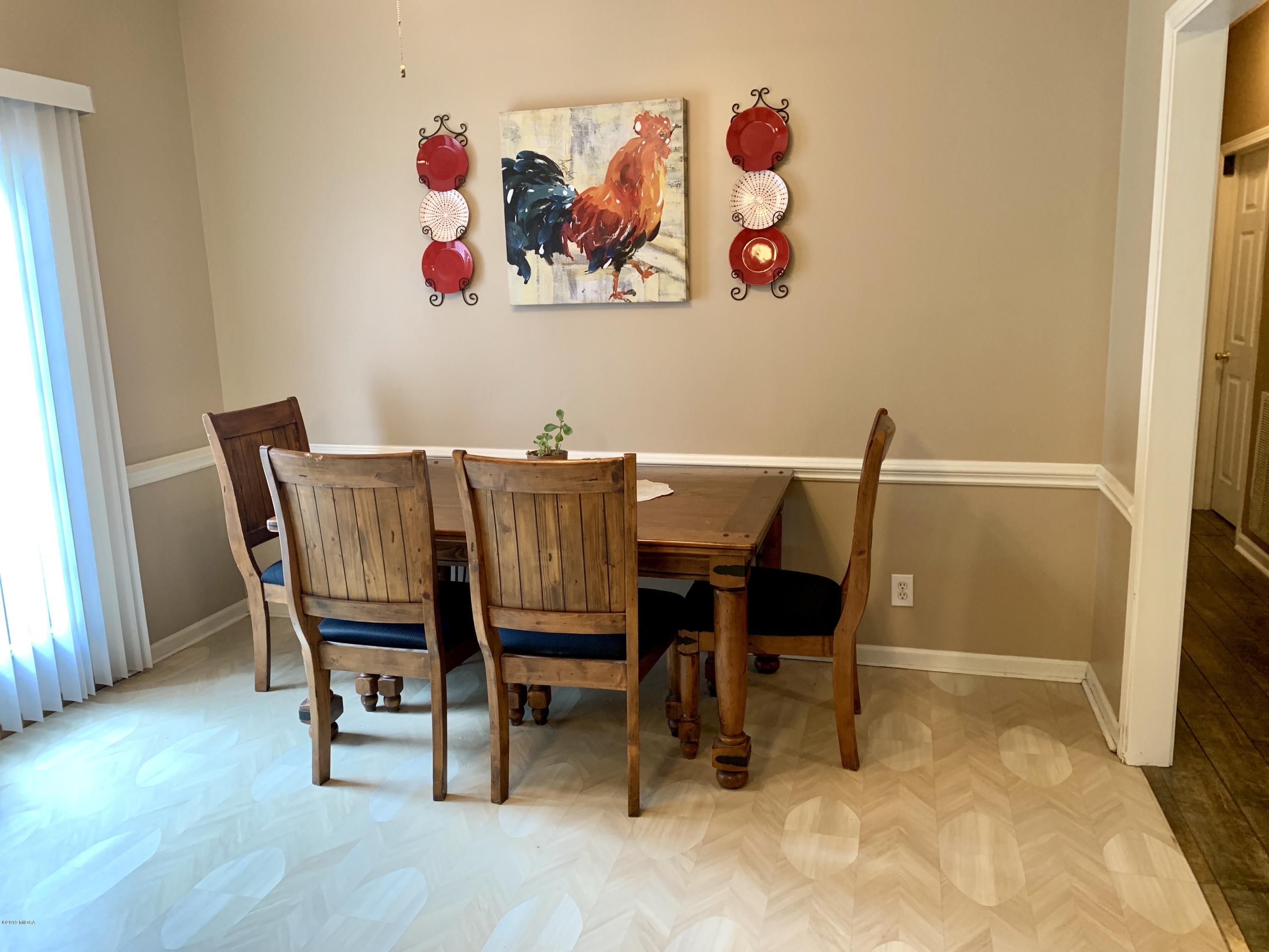 1325 Taylor Road Juliette, GA 31046 - Photo 12 of 18 a view of a dining room with furniture and a kitchen
