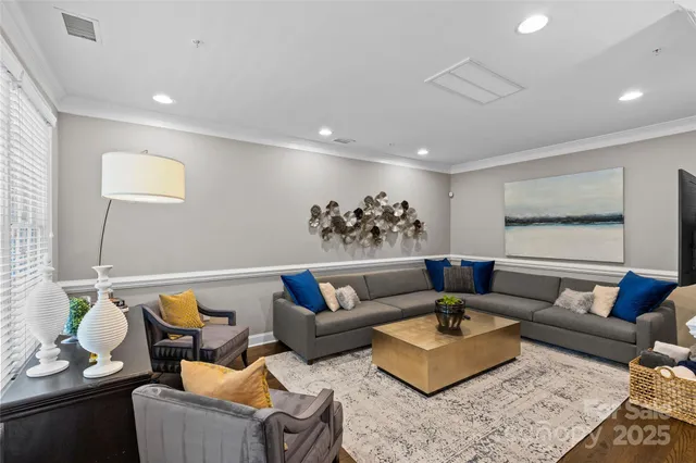 a living room with furniture and a couch