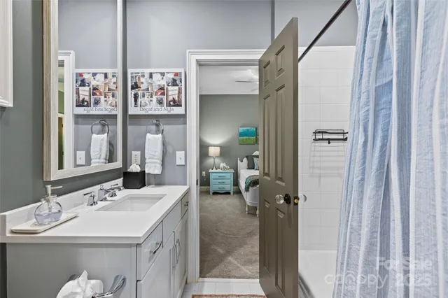 a bathroom with a sink and mirror