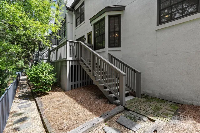 a view of balcony with wooden floor and stairs