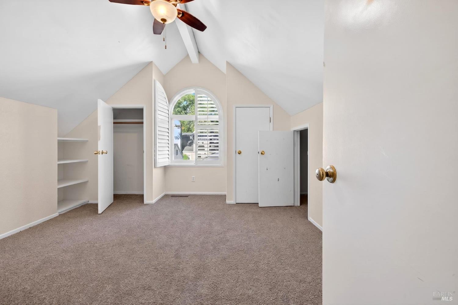 2757 Lakeview Drive Santa Rosa, CA 95405 - Photo 30 of 54 an empty room with windows and ceiling fan
