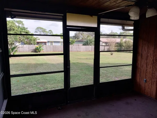 a view of a glass door with a window