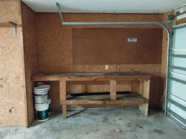 a bathroom with a toilet and a sink