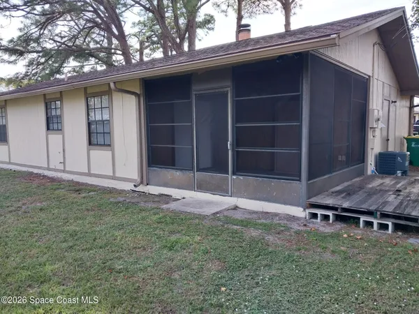 a house with yard in front of it