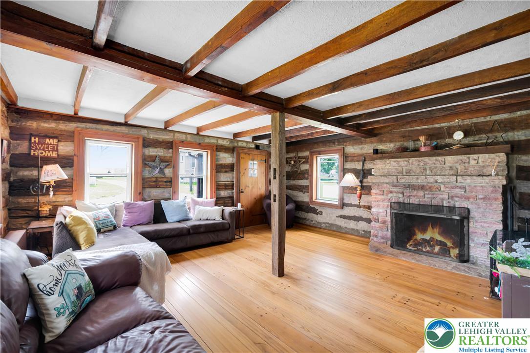 7281 Decatur Street New Tripoli, PA 18066 - Photo 5 of 24 a living room with furniture and a fireplace