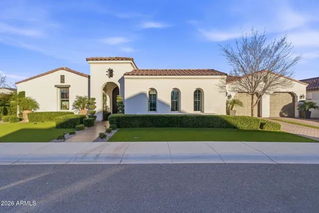 a view of a patio with couches table and chairs and potted plants