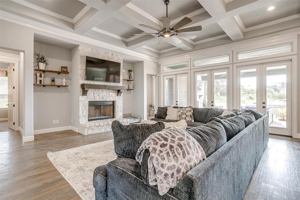 2161 Eagles Rdg Drive Weatherford, TX 76087 - Photo 11 of 40 a living room with furniture fireplace and flat screen tv